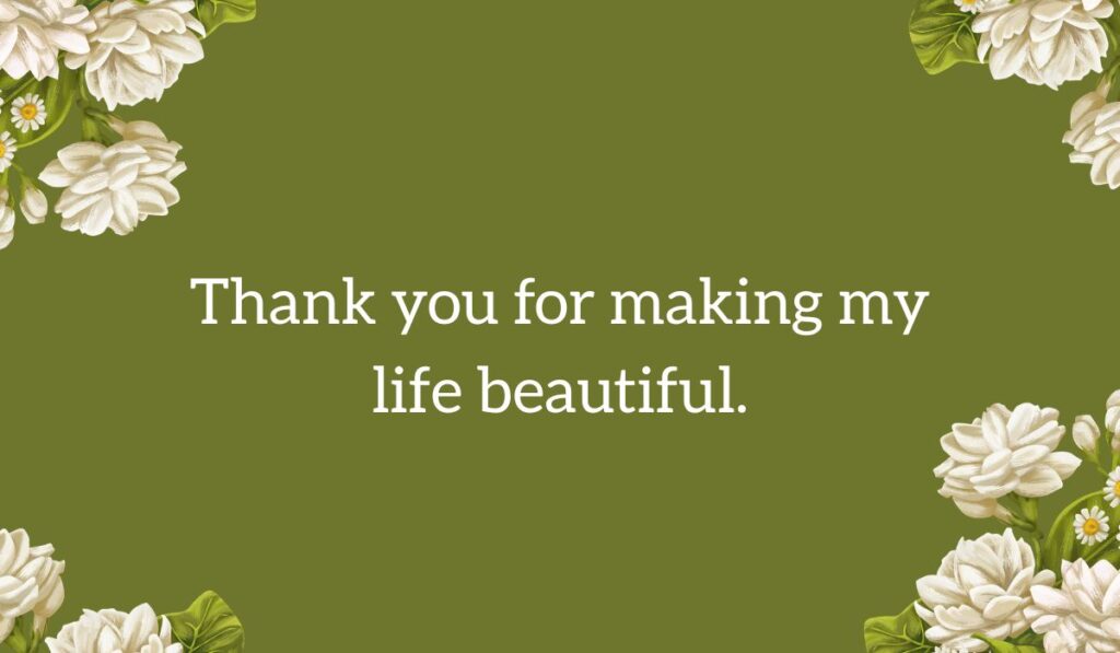 Olive green background graphic adorned with white jasmine flowers, featuring the text "Thank you for making my life beautiful." as a sweet love message for my wife.