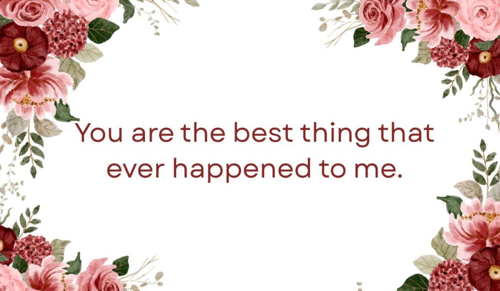 Beautiful quote card with a deep love message for my wife reading "You are the best thing that ever happened to me." framed by dark red and pink flowers.