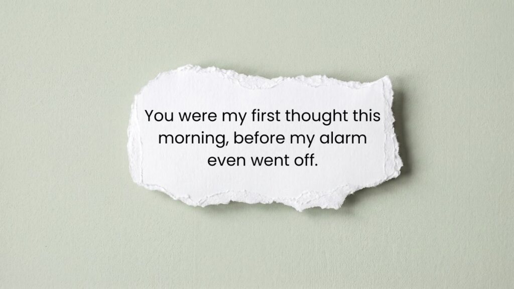 Torn white paper on green background showing good morning have a great day message.