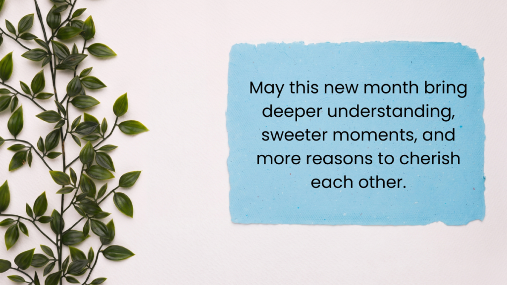 Blue paper card beside leafy green vines displaying encouraging new month quotes about love.
