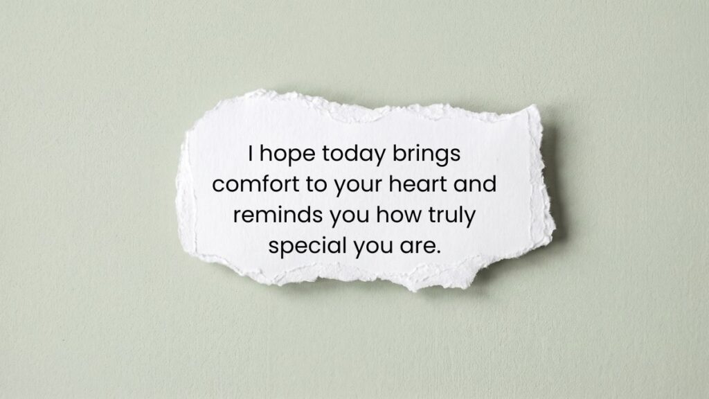 Torn piece of white paper on light green background with words wishing you a great day.